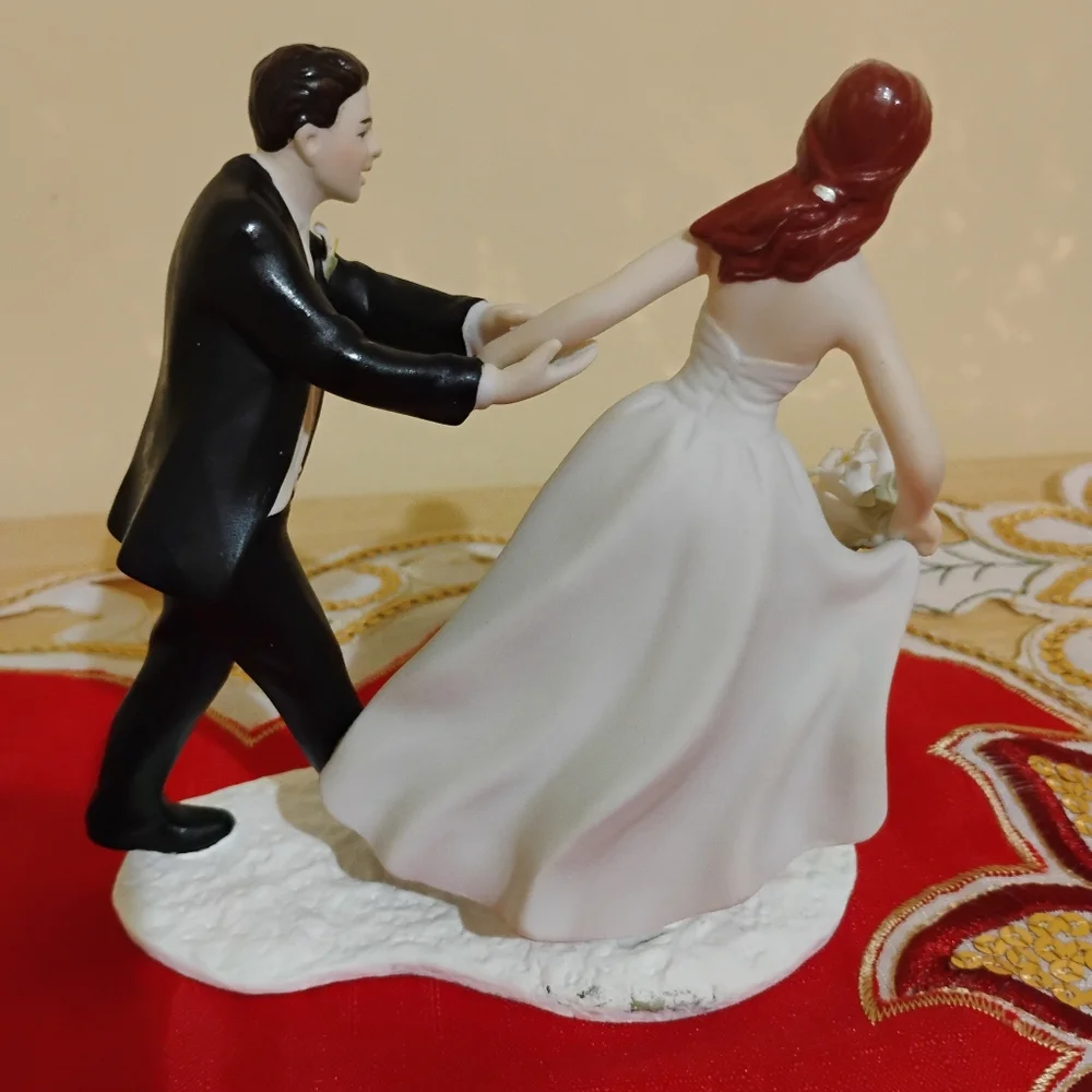 Elegant Wedding Cake Topper with Bride and Groom